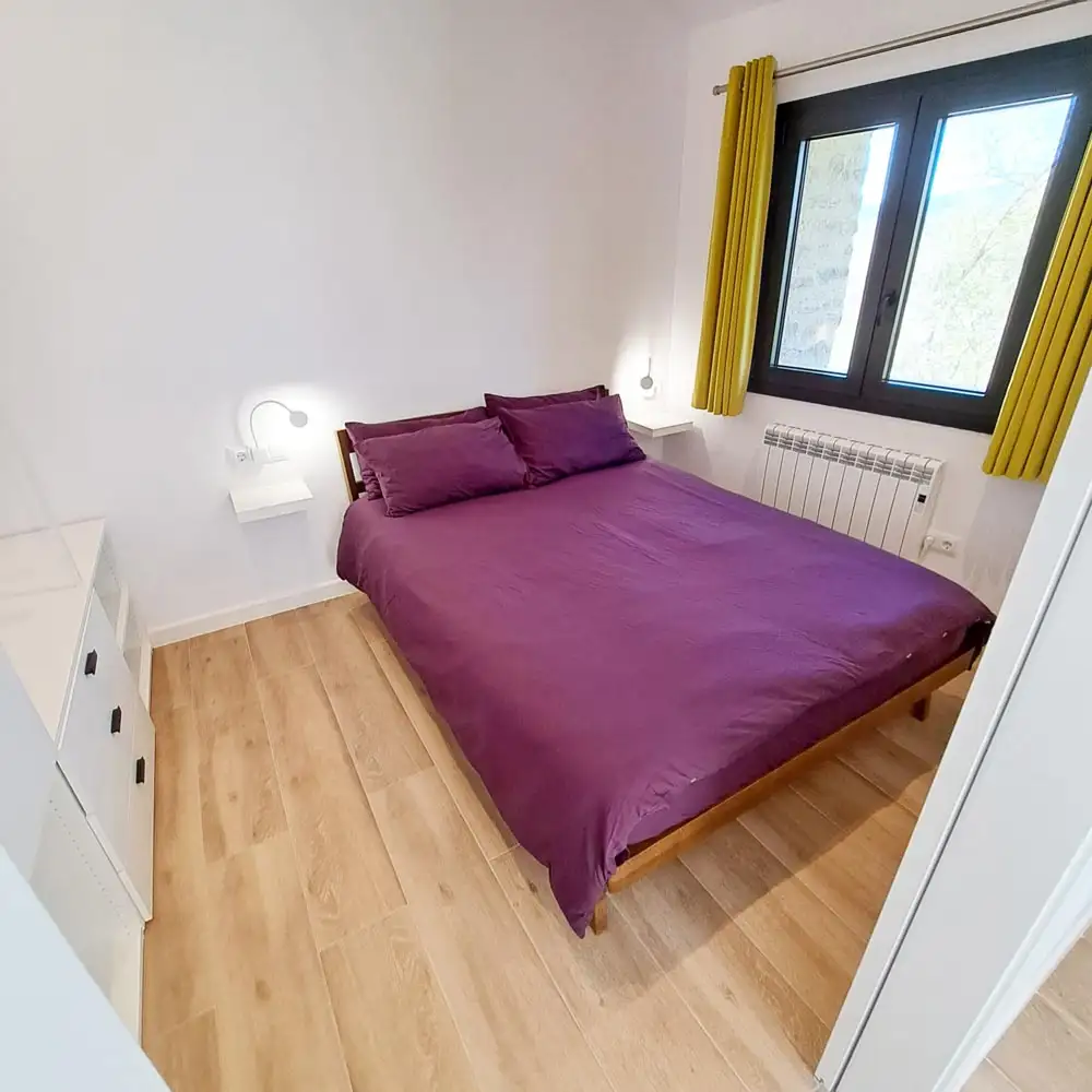 First Guest Bedroom Holiday home bedroom featuring a comfortable double bed and modern wardrobe setup.