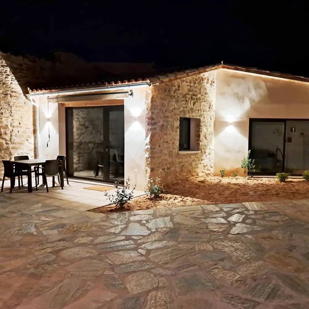 Patio At Night Courtyard patio dining area lit up at night for al fresco dinners at Casa Terradets near Tremp.